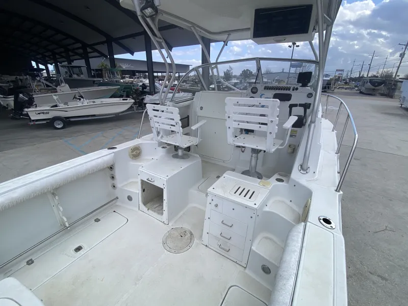 Slide: The Image of Interior view of a 2006 Polar 2300 WA boat at the marina. - 14