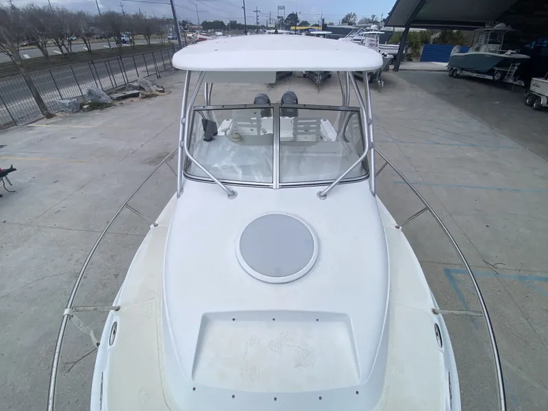 Slide: The Image of 2006 Polar 2300 WA boat on a parking lot. - 4