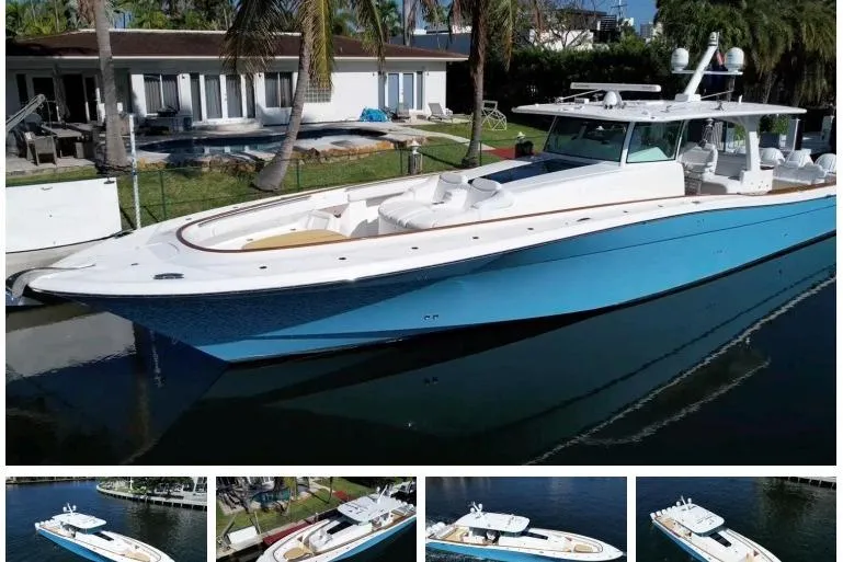 The Image of 2021 HCB 65 Estrella luxury yacht docked by a waterfront home, showcasing sleek design. - 0