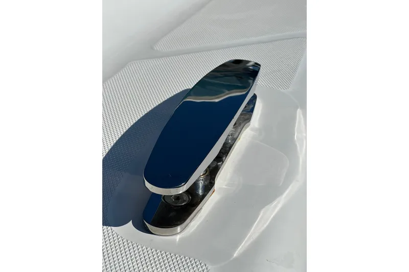 Slide: The Image of Sleek chrome cleat on 2021 HCB 65 Estrella boat deck. - 17