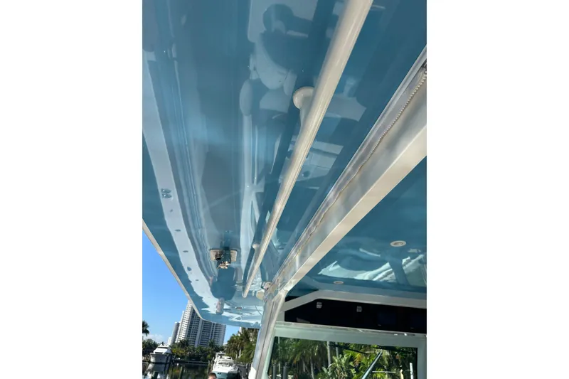 Slide: The Image of 2021 HCB 65 Estrella boat canopy with sleek blue finish and modern design. - 24