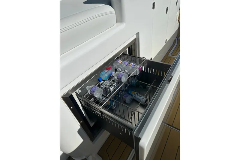 Slide: The Image of Open drawer with bottled drinks on 2021 HCB 65 Estrella boat. - 27