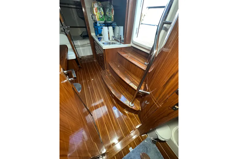 Slide: The Image of Luxurious interior of 2021 HCB 65 Estrella yacht with polished wood finish. - 32