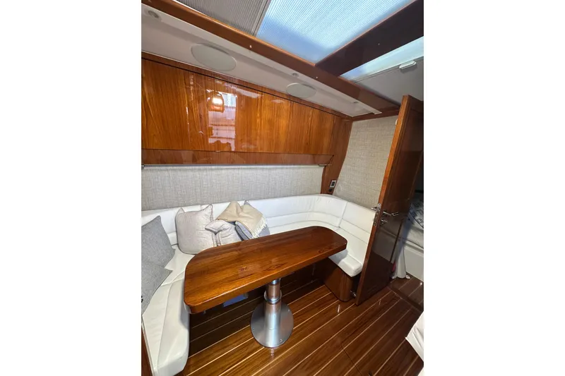 Slide: The Image of Luxurious interior of 2021 HCB 65 Estrella yacht with elegant wood finishes and plush seating. - 34