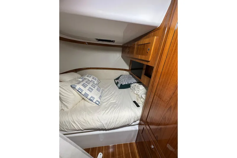 Slide: The Image of Luxurious cabin interior of 2021 HCB 65 Estrella yacht with cozy bedding. - 38