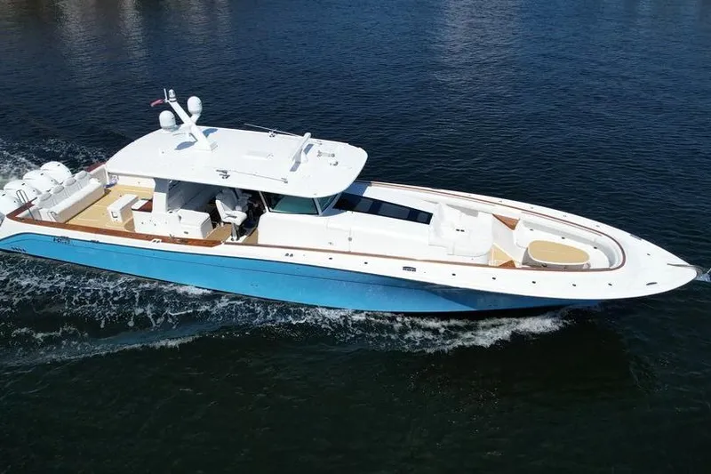 Slide: The Image of 2021 HCB 65 Estrella luxury yacht cruising on open water. - 4