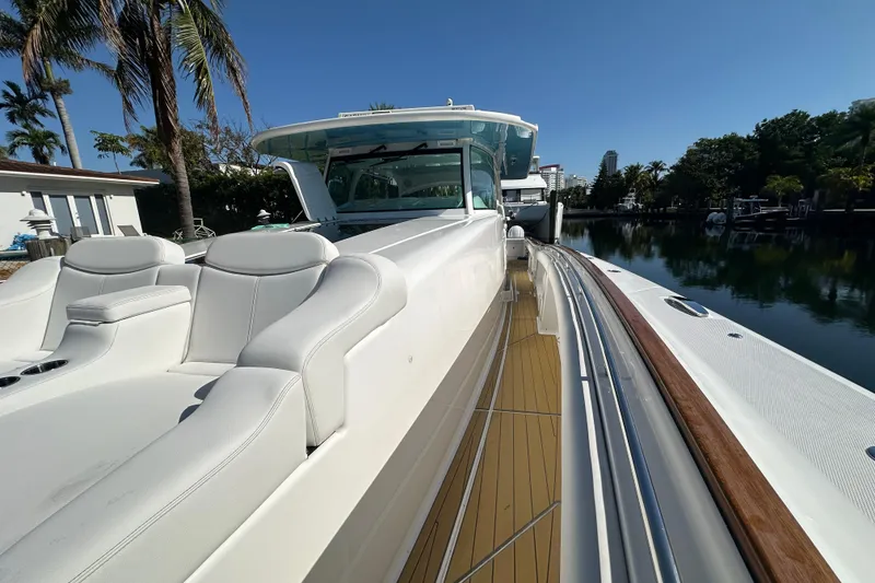 Slide: The Image of 2021 HCB 65 Estrella luxury yacht with sleek white seating and polished deck. - 46