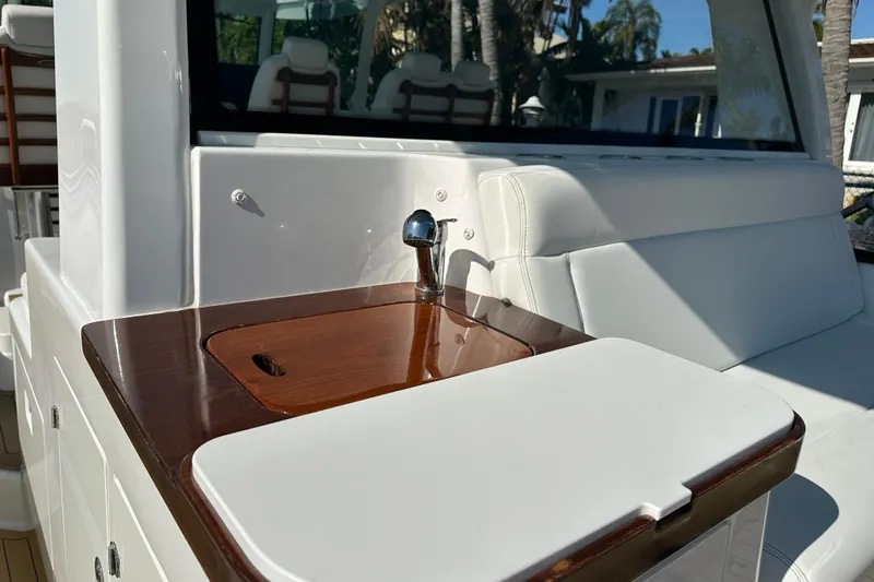 Slide: The Image of Luxury yacht interior with sleek wood and white leather seating, HCB 65 Estrella 2021 model. - 63