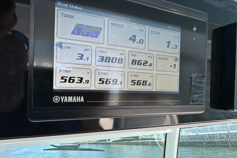 Slide: The Image of Yamaha boat status display on HCB 65 Estrella, showing speed, fuel, and trip data. - 75
