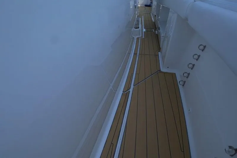 Slide: The Image of Side deck of 2021 HCB 65 Estrella yacht with teak flooring. - 79