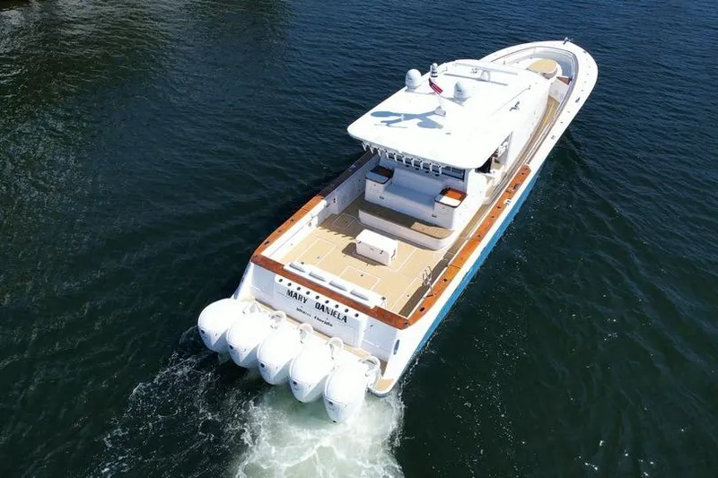 Slide: The Image of Aerial view of 2021 HCB 65 Estrella luxury boat cruising on water. - 95