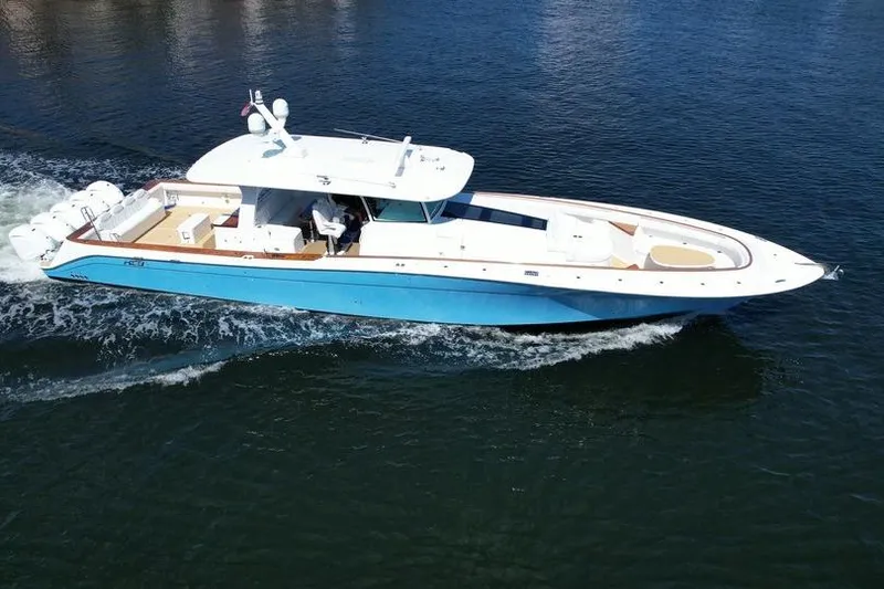 Slide: The Image of 2021 HCB 65 Estrella yacht cruising on open water, side view. - 96