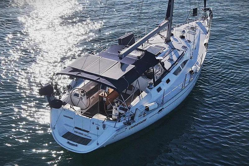 The Image of 2003 Jeanneau Sun Odyssey 45.2 sailboat on shimmering water, aerial view. - 0