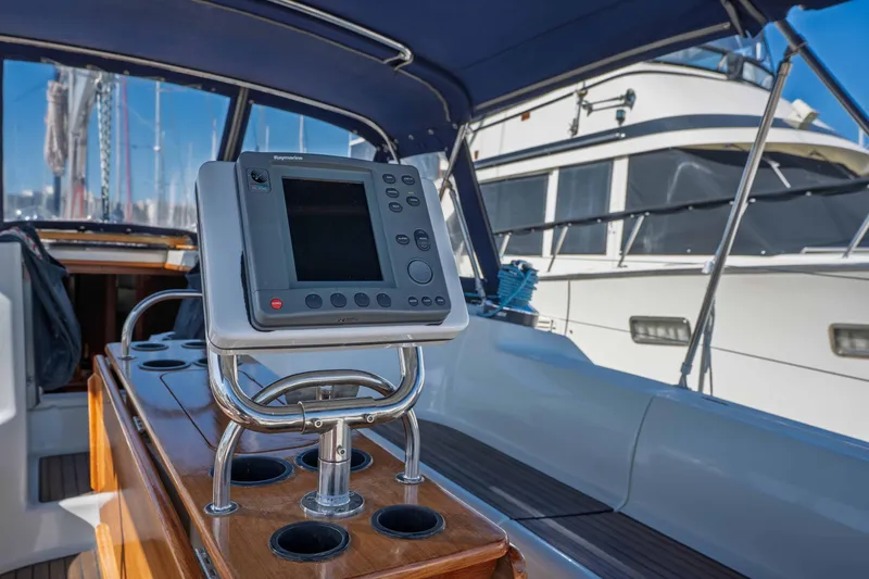 Slide: The Image of Raymarine Radar / chartplotter on cockpit table. - 21