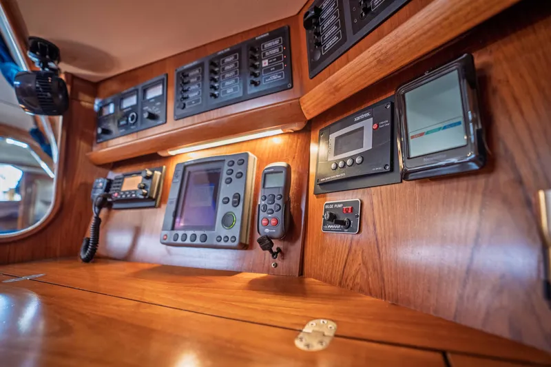 Slide: The Image of Control panel of 2003 Jeanneau Sun Odyssey 45.2 yacht with navigation instruments. - 52