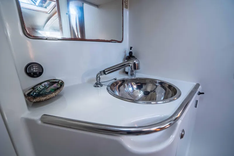 Slide: The Image of Aft bathroom sink area on a 2003 Jeanneau Sun Odyssey 45.2 yacht. - 75