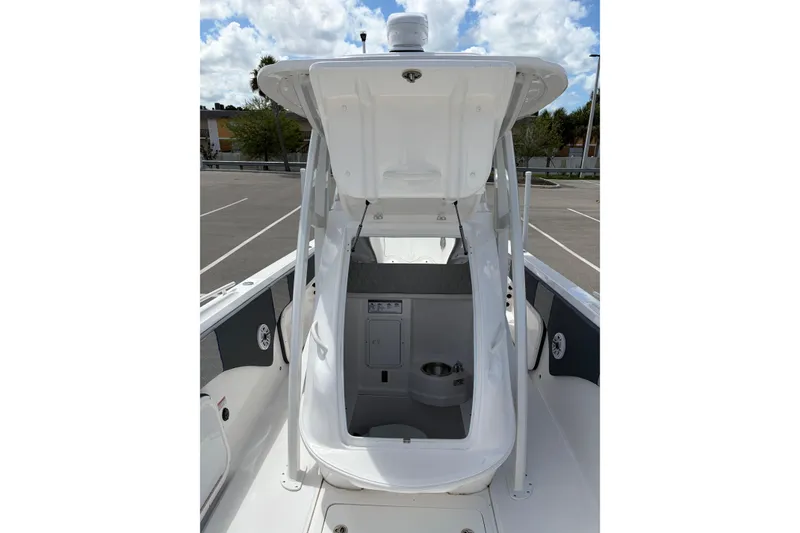 Slide: The Image of 2025 Glasstream 328 SCX boat interior with open cabin and modern amenities. - 10