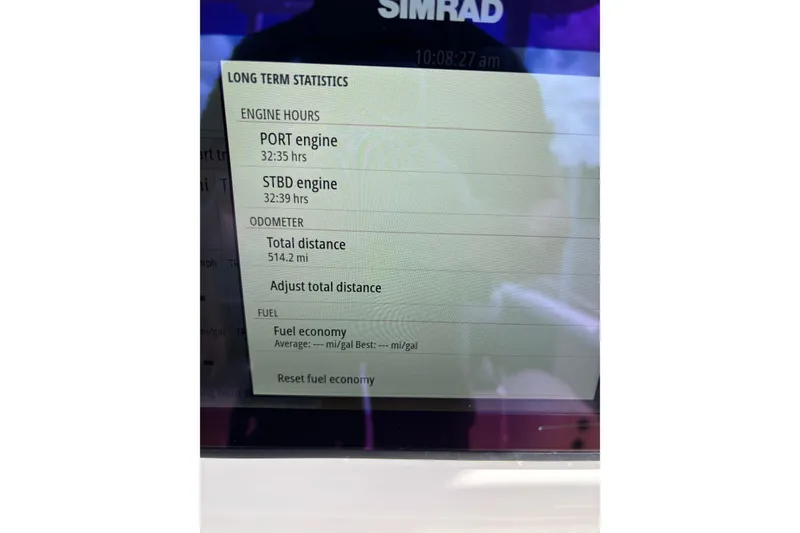 Slide: The Image of Display screen showing engine hours and odometer for 2025 Glasstream 328 SCX boat. - 14
