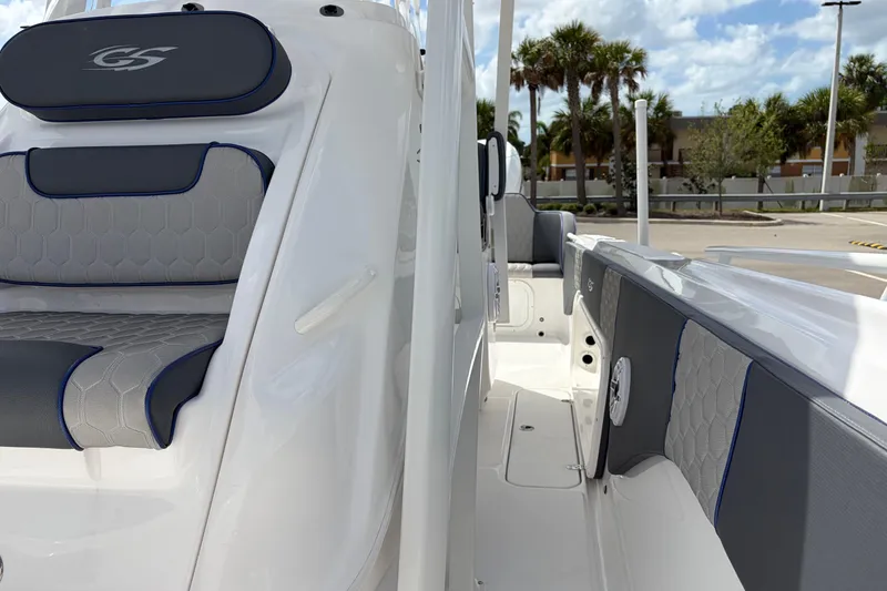 Slide: The Image of 2025 Glasstream 328 SCX boat interior with sleek seating and modern design. - 33