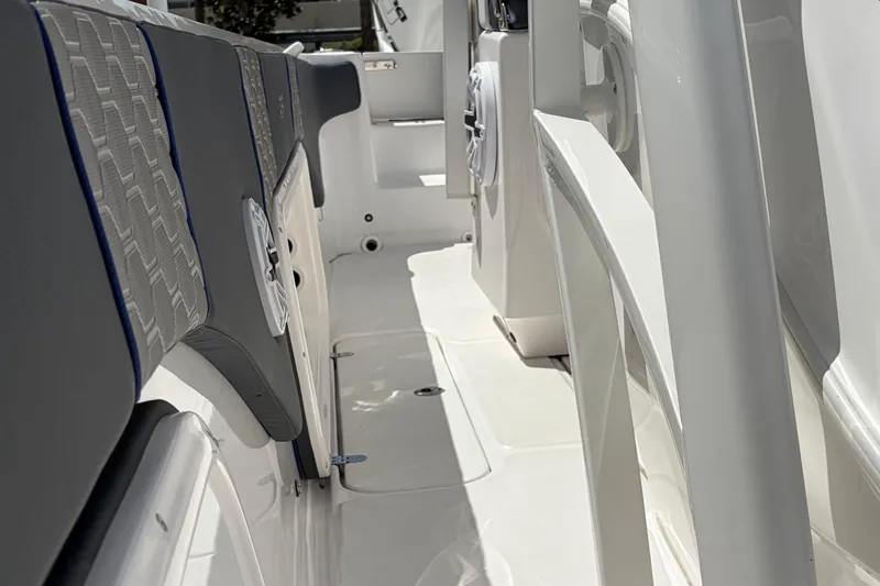 Slide: The Image of 2025 Glasstream 328 SCX boat interior with sleek seating and modern design. - 39