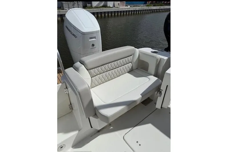 Slide: The Image of Luxury seating on 2026 World Cat 400 DC-X Island boat, featuring elegant upholstery. - 11