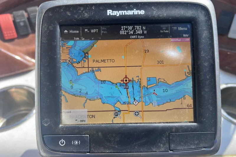 Slide: The Image of Raymarine GPS displaying nautical map on 2012 SouthWind 212 SD boat dashboard. - 16