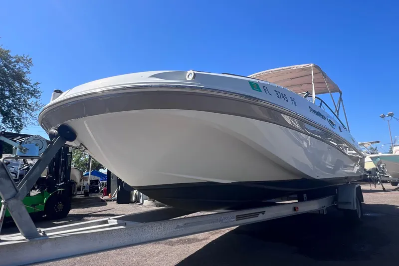 Slide: The Image of 2012 SouthWind 212 SD boat on trailer under clear blue sky. - 4