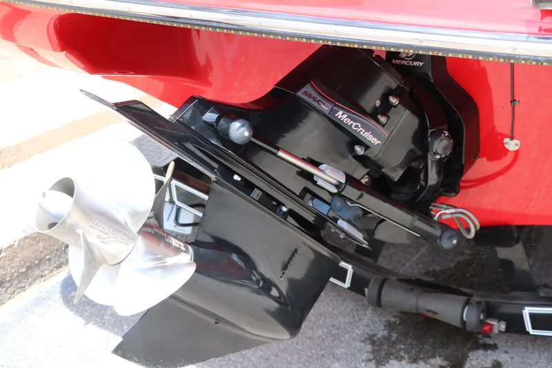 Slide: The Image of 2009 Crownline 23 SS boat with MerCruiser Bravo Three outdrive and stainless steel propeller. - 13