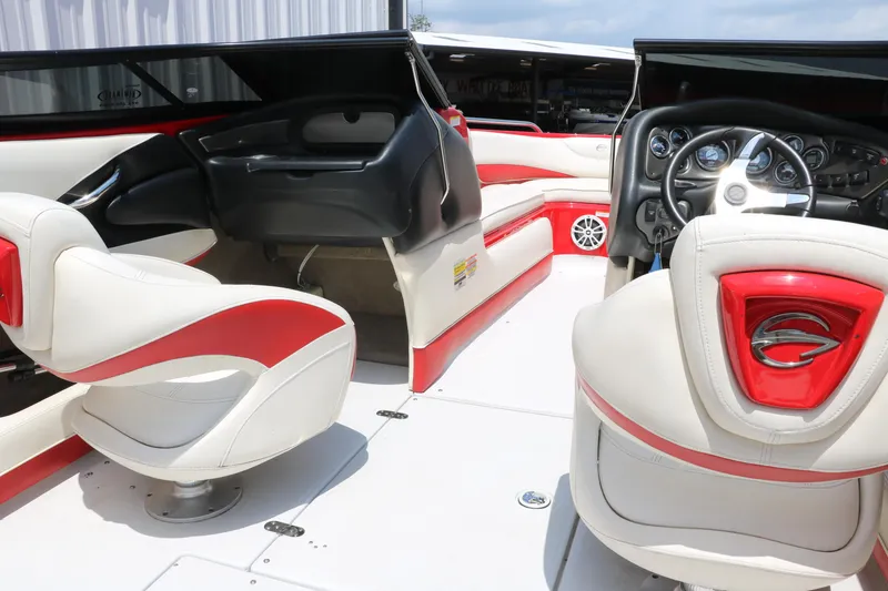 Slide: The Image of Interior of a 2009 Crownline 23 SS boat with red and white seating. - 37