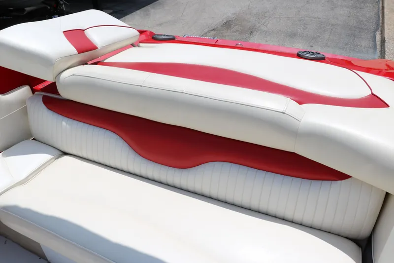 Slide: The Image of 2009 Crownline 23 SS boat interior with red and white seating. - 43