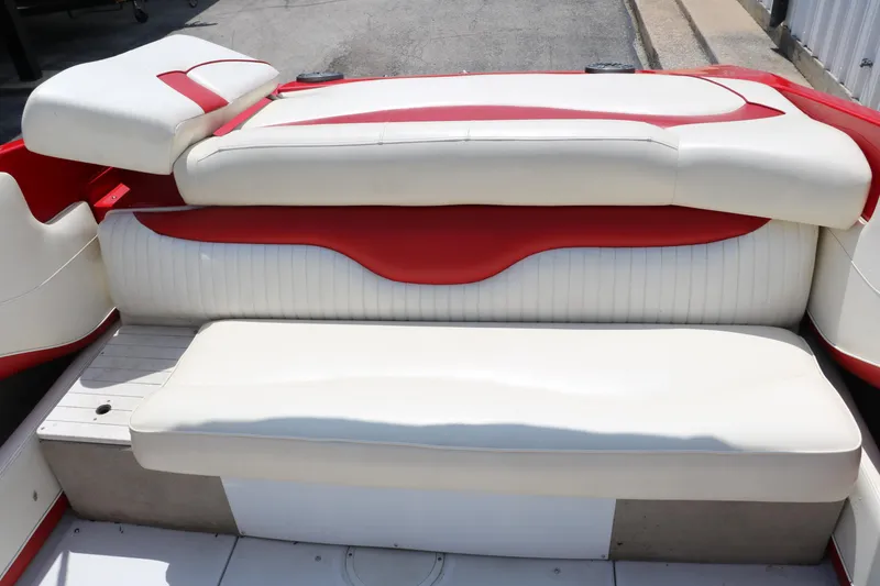 Slide: The Image of 2009 Crownline 23 SS boat interior with white and red seating. - 46