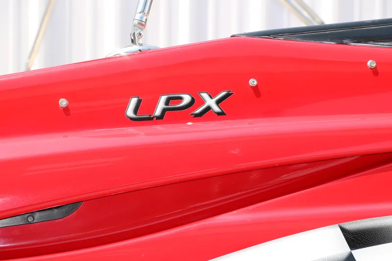 Slide: The Image of Red 2009 Crownline 23 SS boat with LPX logo detail. - 48