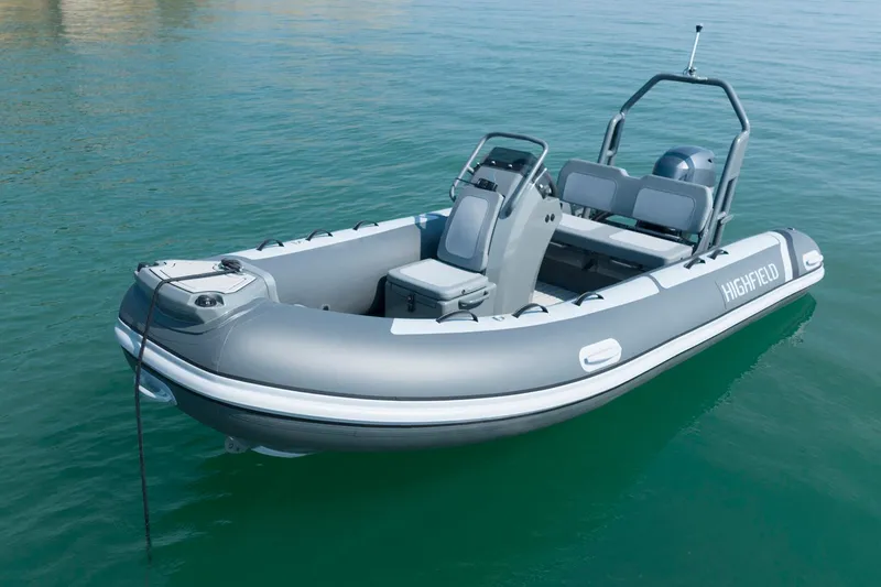 The Image of Manufacturer Provided Image: 2025 Highfield Classic 420 boat on calm water, featuring sleek design and modern features. - 3