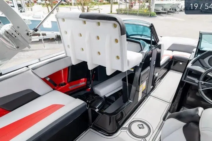 Slide: The Image of 2019 MasterCraft XStar interior with modern seating and sleek design. - 16