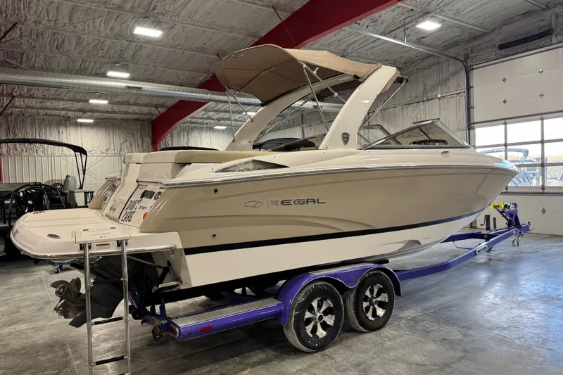 Slide: The Image of 2015 Regal 2700 Bowrider boat on trailer in indoor storage facility. - 4