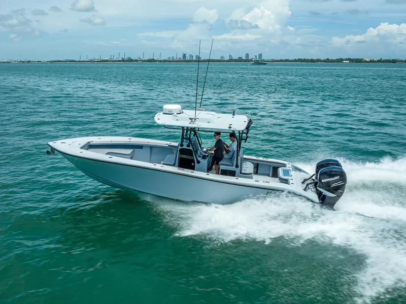 Slide: The Image of 2021 Yellowfin 29 Offshore boat cruising on the sea. - 14