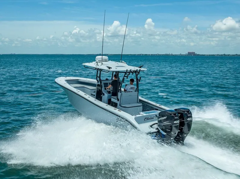 Slide: The Image of 2021 Yellowfin 29 Offshore boat cruising on open sea. - 22