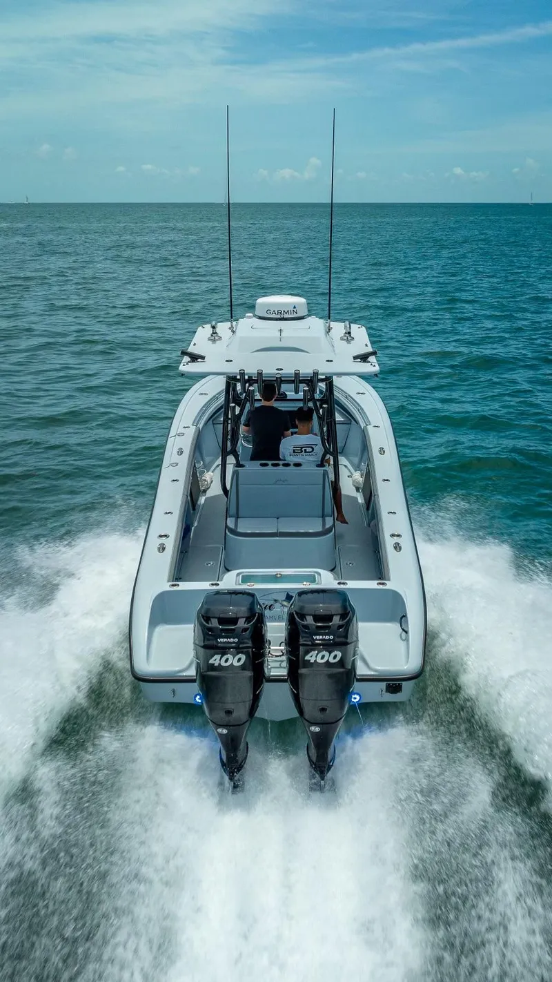 Slide: The Image of 2021 Yellowfin 29 Offshore boat cruising on open sea. - 23