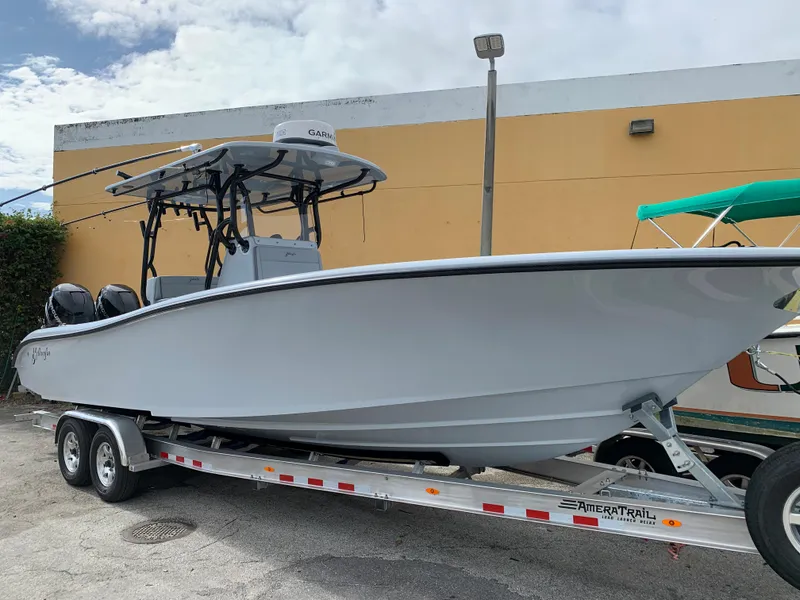 Slide: The Image of 2021 Yellowfin 29 Offshore boat on trailer, side view. - 28