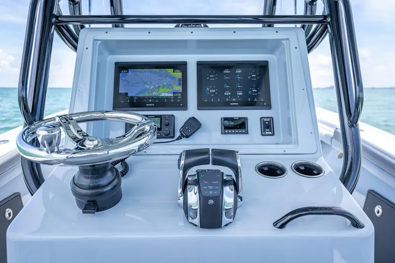 Slide: The Image of 2021 Yellowfin 29 Offshore helm with advanced navigation systems. - 29
