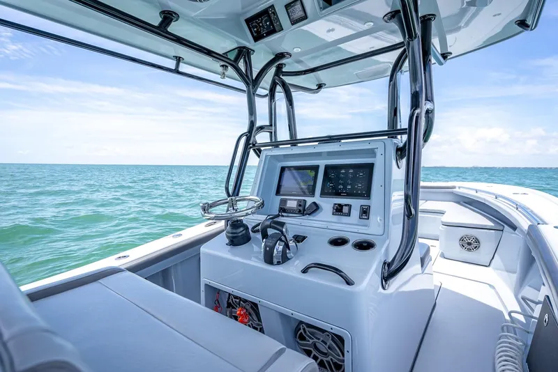 Slide: The Image of Interior view of a 2021 Yellowfin 29 Offshore boat on the sea. - 30