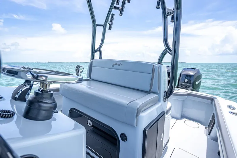 Slide: The Image of Interior view of a 2021 Yellowfin 29 Offshore boat on the sea. - 31