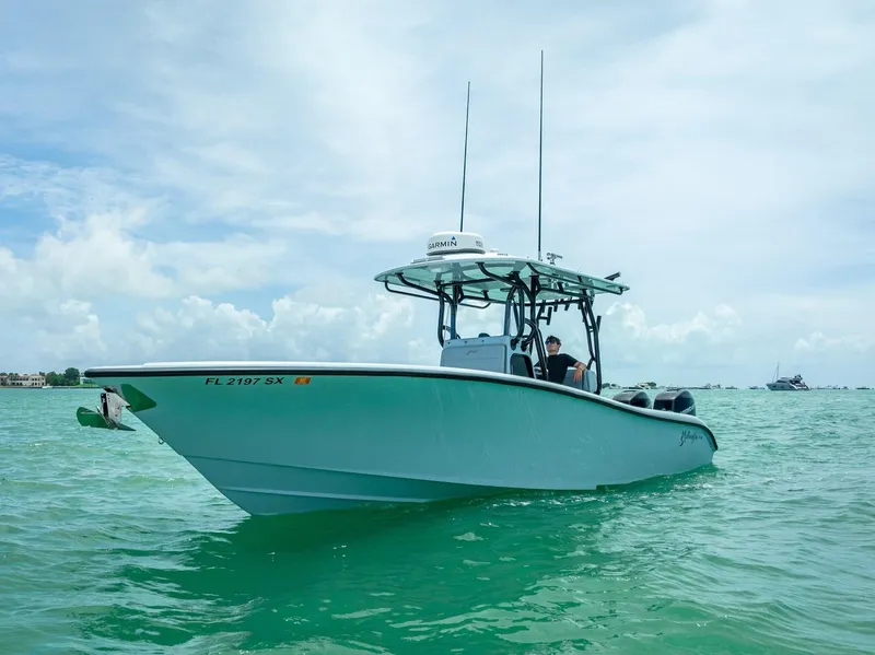 Slide: The Image of 2021 Yellowfin 29 Offshore boat on calm waters. - 4