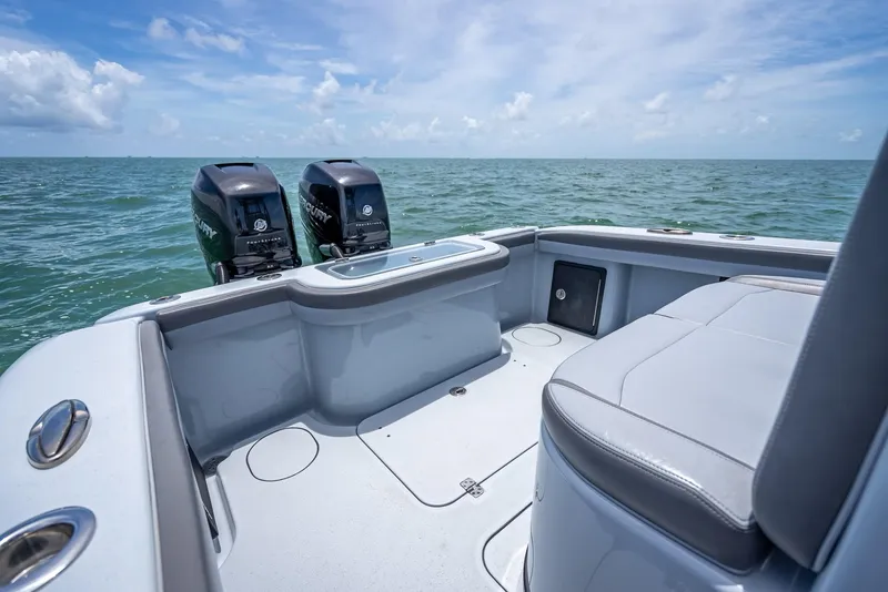 Slide: The Image of 2021 Yellowfin 29 Offshore boat on open sea with dual outboard engines. - 43