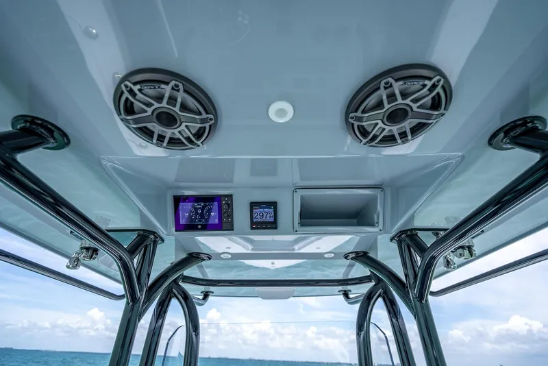 Slide: The Image of Interior view of 2021 Yellowfin 29 Offshore boat with speakers and electronics. - 45