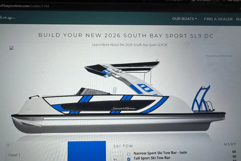 Slide: The Image of 2026 South Bay 25 Sport Twin pontoon boat with sleek design and blue accents. - 13
