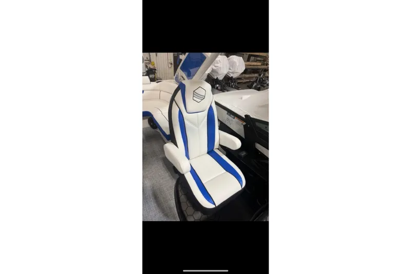 Slide: The Image of White and blue seat of 2026 South Bay 25 Sport Twin boat. - 8