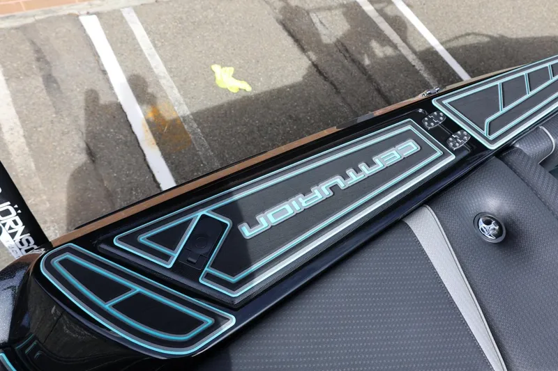 Slide: The Image of 2021 Centurion Fi23 boat deck with sleek design and branding details. - 25