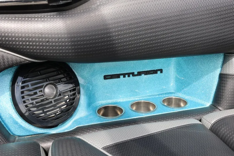 Slide: The Image of 2021 Centurion Fi23 interior detail with speaker and cup holders. - 31