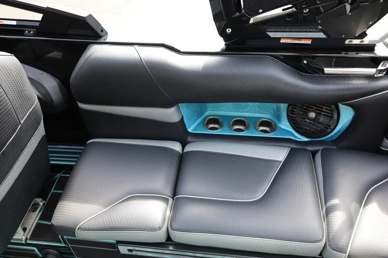 Slide: The Image of 2021 Centurion Fi23 interior seating with sleek design and integrated cup holders. - 37